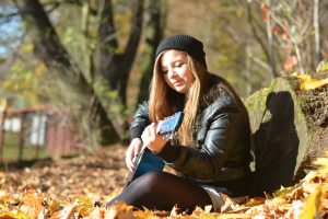 playing the guitar in the fall