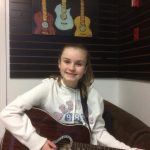 having fun taking lessons at Red Guitar